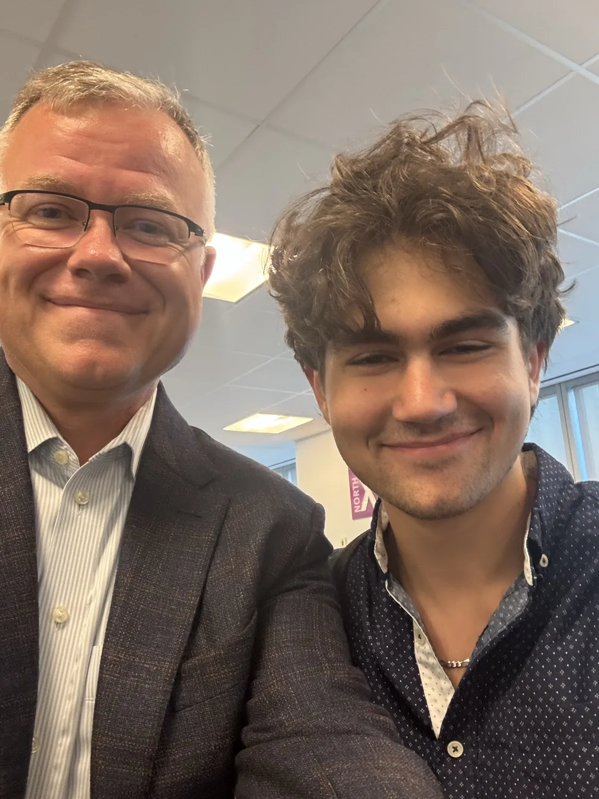 Daniel and his dad visiting the RBC office.